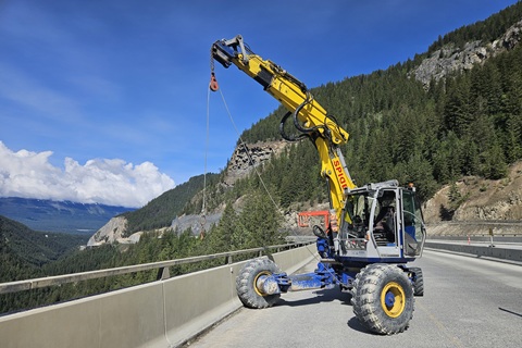 The spider excavator demonstrating its reach