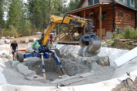 Grading and trenching the hard-to-reach areas without disturbing existing structures.